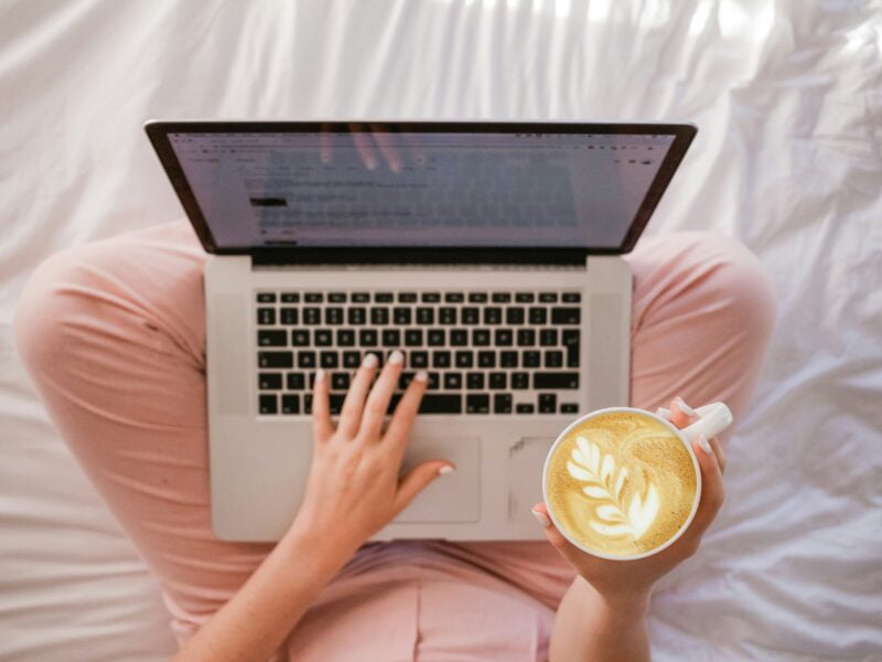 Morning coffee and laptop for health insurance application.